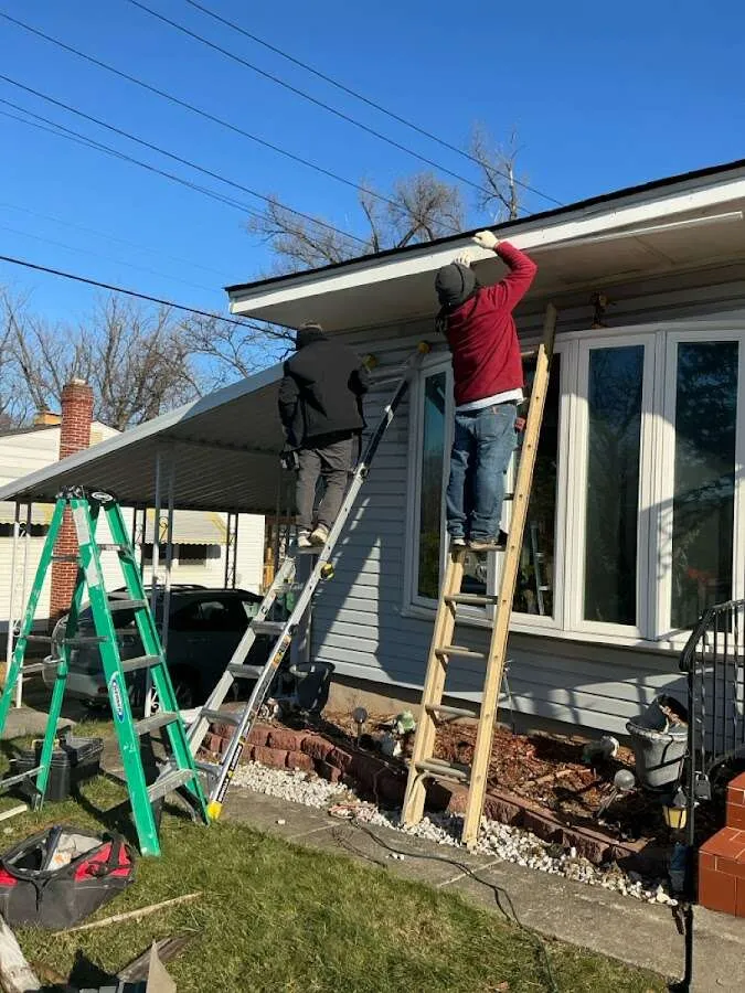 Restoration crew performing exterior repair in Sugarland Run